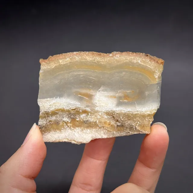 Hokkaidoite slice 1A03 in daylight (8/9) — 6.8 × 5 × 0.7 cm, Hokkaido, Japan · Kitsune Mineral