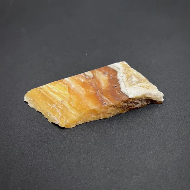 Hokkaidoite slice 1B06 in daylight (7/10) — 9 × 4.3 × 1.2 cm, Hokkaido, Japan · Kitsune Mineral
