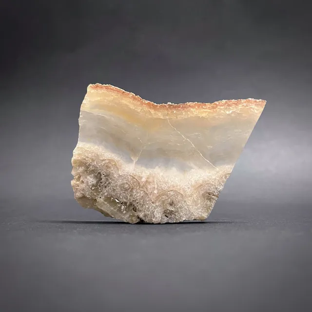 Hokkaidoite slice 1B08 in daylight (8/10) — 6.5 × 5.5 × 0.6 cm, Hokkaido, Japan · Kitsune Mineral