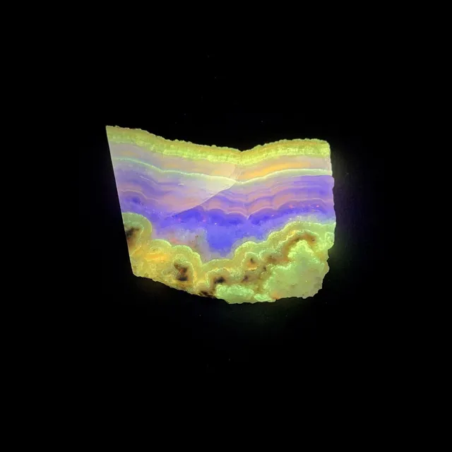 Hokkaidoite slice 1B08 under UV light (3/10) — 6.5 × 5.5 × 0.6 cm, Hokkaido, Japan · Kitsune Mineral