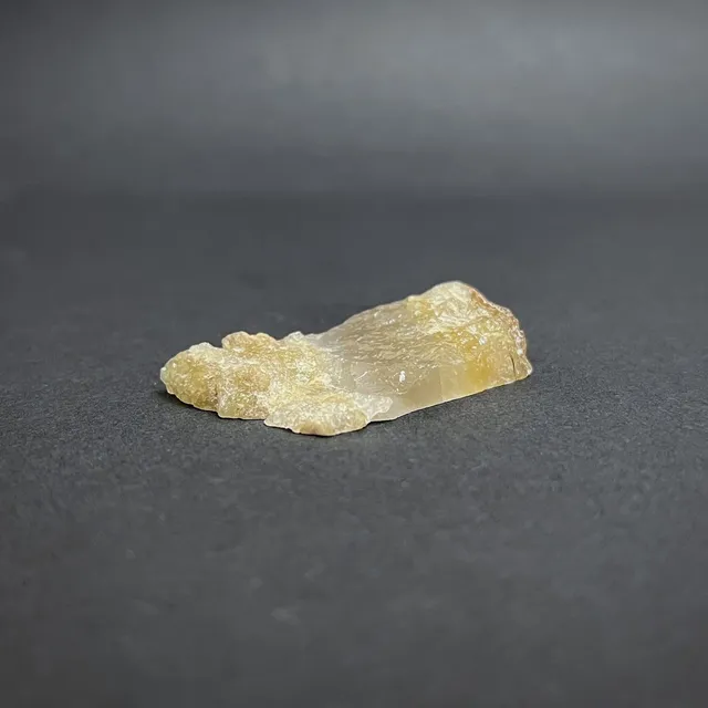 Hokkaidoite slice 1C01 in daylight (9/11) — 4.4 × 2.3 × 0.9 cm, Hokkaido, Japan · Kitsune Mineral