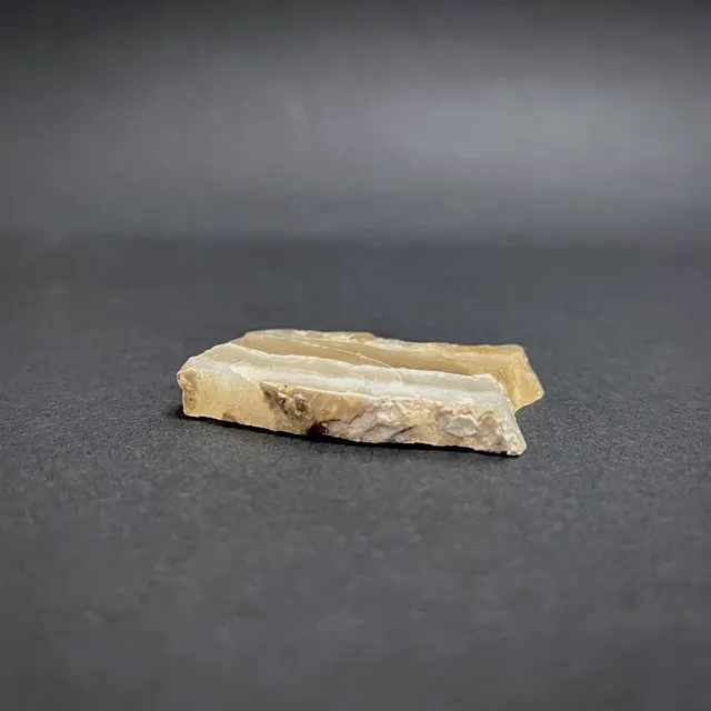Hokkaidoite slice 1C04 in daylight (9/10) — 4.7 × 2.7 × 0.8 cm, Hokkaido, Japan · Kitsune Mineral