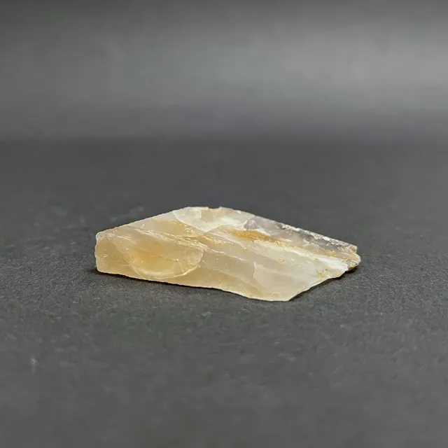 Hokkaidoite slice 1C08 in daylight (12/15) — 5.1 × 2.8 × 0.7 cm, Hokkaido, Japan · Kitsune Mineral