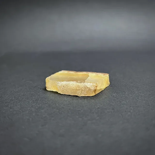 Hokkaidoite slice 1C09 in daylight (9/10) — 3.6 × 2.9 × 0.6 cm, Hokkaido, Japan · Kitsune Mineral