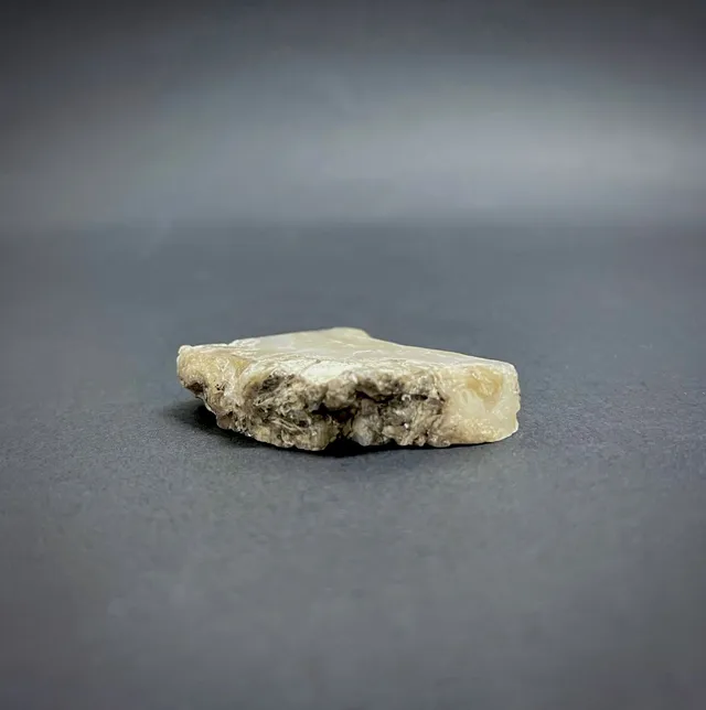 Hokkaidoite slice 1C12 in daylight (8/11) — 5.1 × 4 × 1 cm, Hokkaido, Japan · Kitsune Mineral