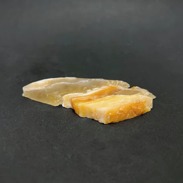 Hokkaidoite slice 2A03 in daylight (9/10) — 9.3 × 4.3 × 0.7 cm, Hokkaido, Japan · Kitsune Mineral