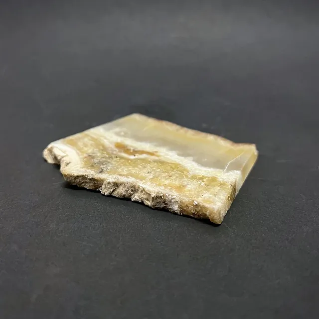 Hokkaidoite slice 2A06 in daylight (9/10) — 8.3 × 6.8 × 0.6 cm, Hokkaido, Japan · Kitsune Mineral