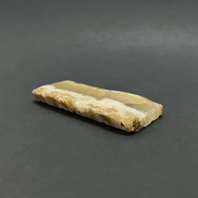 Hokkaidoite slice 2A07 in daylight (8/9) — 9.2 × 4.2 × 1 cm, Hokkaido, Japan · Kitsune Mineral