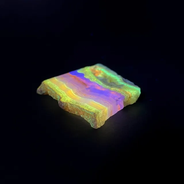 Hokkaidoite slice 2B02 under UV light (3/9) — 5.8 × 5.8 × 0.8 cm, Hokkaido, Japan · Kitsune Mineral