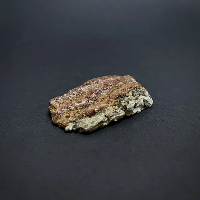 Hokkaidoite slice 2B11 in daylight (9/11) — 5.5 × 3.5 × 1.0 cm, Hokkaido, Japan · Kitsune Mineral
