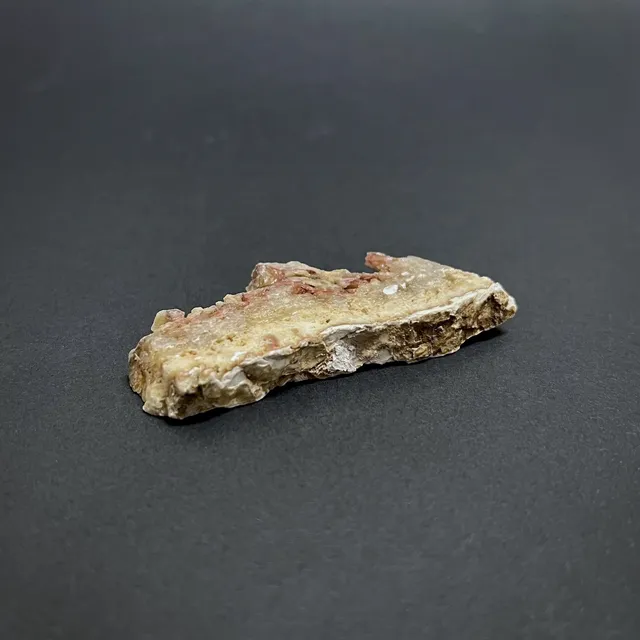 Hokkaidoite slice 2B13 in daylight (8/9) — 6.5 × 2.5 × 0.9 cm, Hokkaido, Japan · Kitsune Mineral