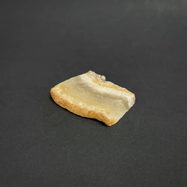 Hokkaidoite slice 2C03 in daylight (8/9) — 5.2 × 3.6 × 0.6 cm, Hokkaido, Japan · Kitsune Mineral