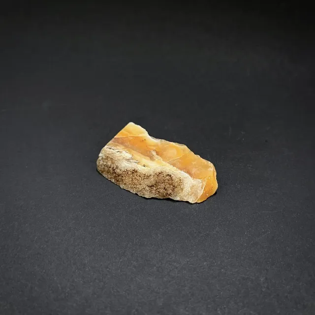 Hokkaidoite slice 2C05 in daylight (9/10) — 4.5 × 2.6 × 0.7 cm, Hokkaido, Japan · Kitsune Mineral