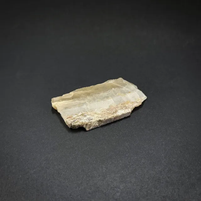 Hokkaidoite slice 2C06 in daylight (8/9) — 5.4 × 2.9 × 0.5 cm, Hokkaido, Japan · Kitsune Mineral