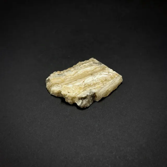 Hokkaidoite slice 2C10 in daylight (8/9) — 4.1 × 3.7 × 0.7 cm, Hokkaido, Japan · Kitsune Mineral