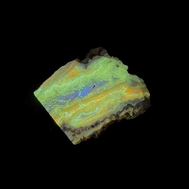 Hokkaidoite slice 2C10 under UV light (3/9) — 4.1 × 3.7 × 0.7 cm, Hokkaido, Japan · Kitsune Mineral
